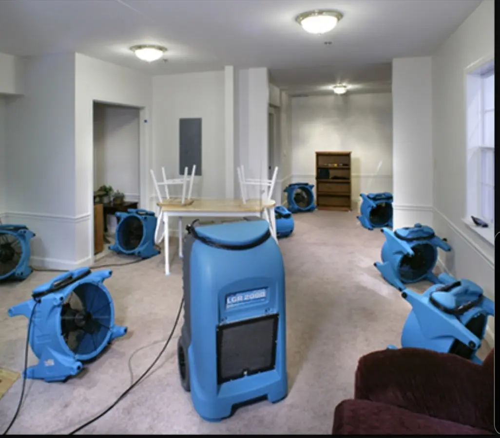 Air movers and dehumidifier setup for Water Extraction & Removal in Barberton